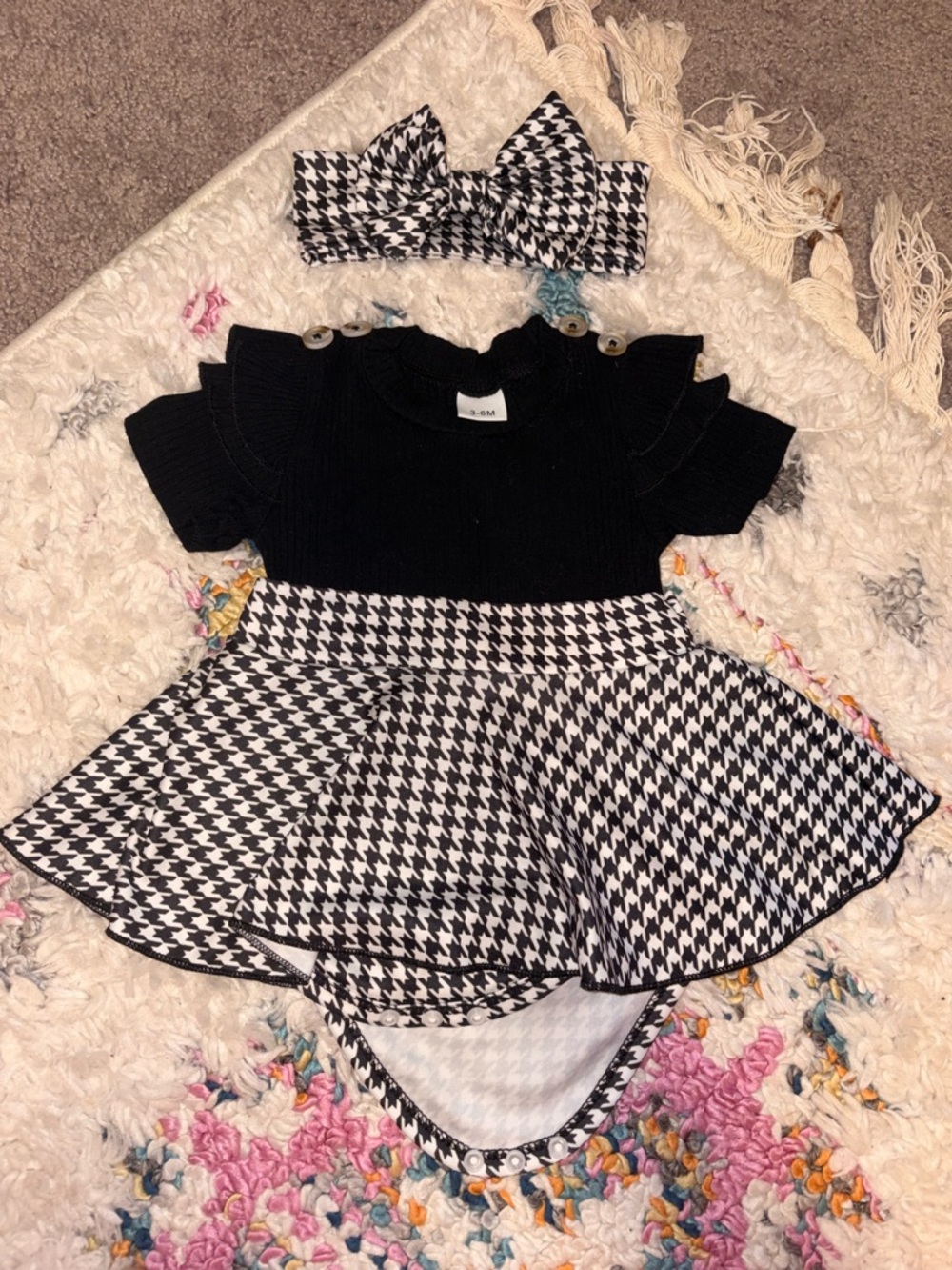 Black & White Houndstooth Baby One-Piece with Bow